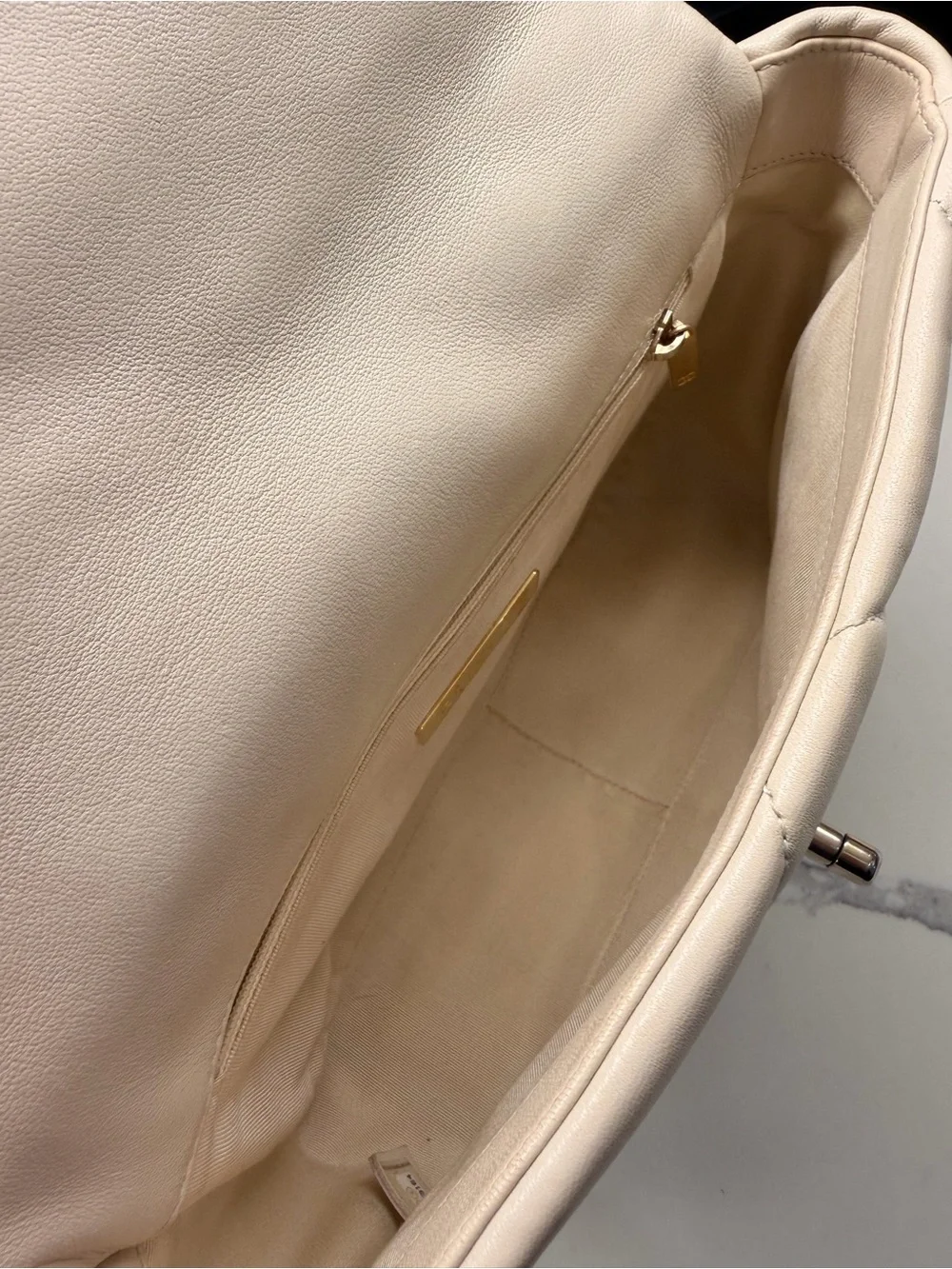 CHANEL 19 Medium quilted lambskin in light beige